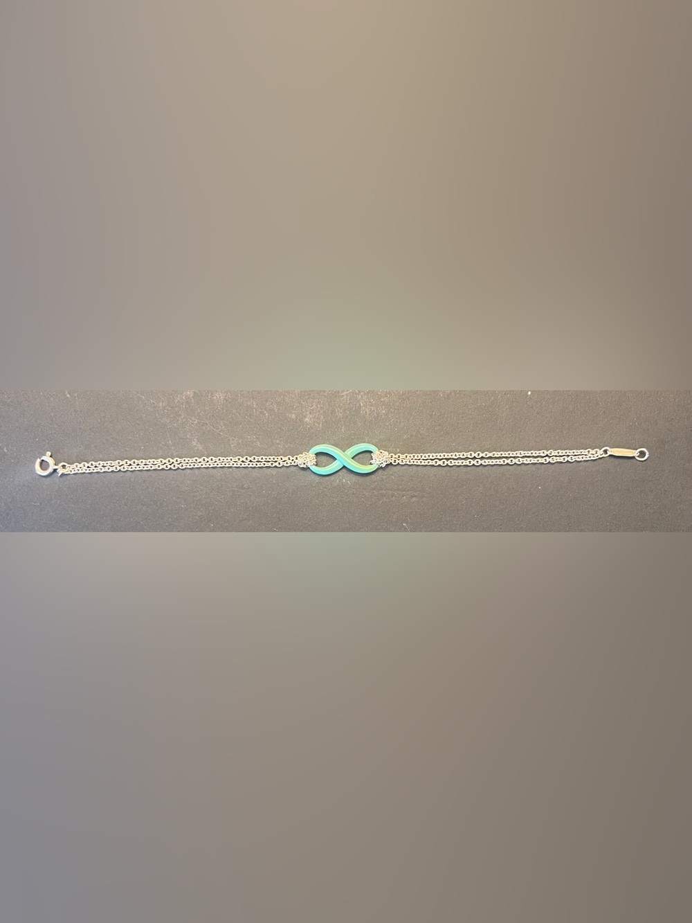 Tiffany & Co. Genuine Sterling Silver Bracelet with Turquoise Infinity Charm